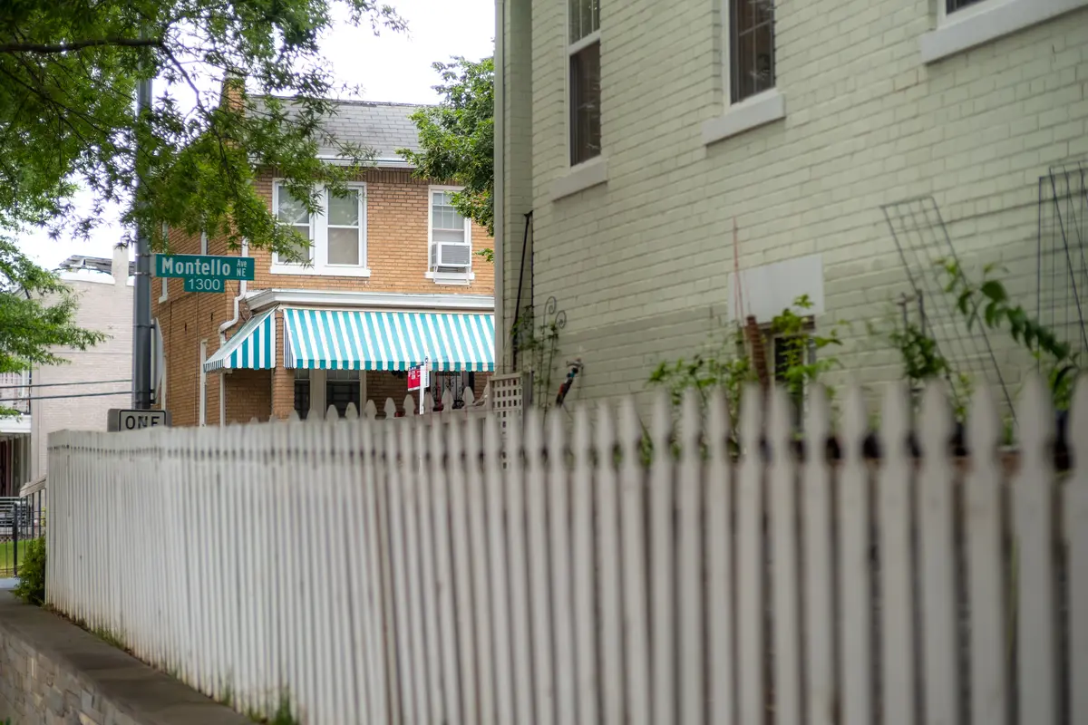 Photographs from the Trinidad Neighborhood and the Trinidad Farmer's Market in Washington, DC, United States- with visible white fence on June 15, 2025.