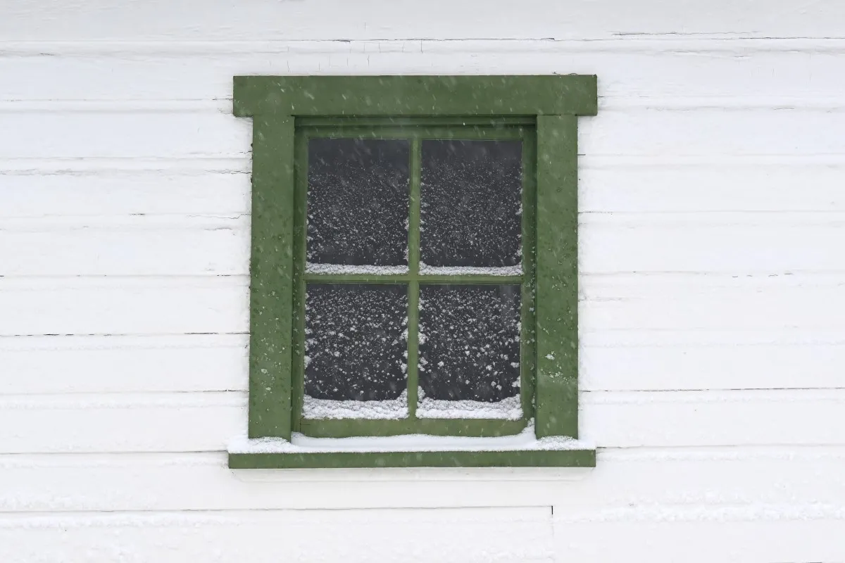 Snow gathers on a window at Heritage Lakewood Park after a winter storm dropped several inches of snow across the area in Lakewood, Colo., on Dec. 3, 2025. 